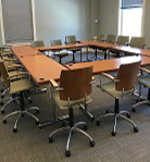 Holden Room setup with tables and chairs at the library