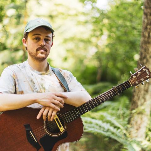 Reese Fulmer with his guitar