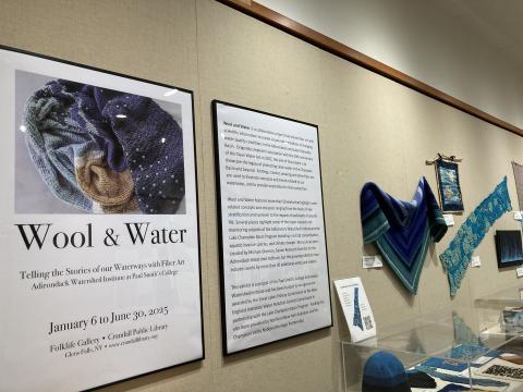 Knitted and crocheted art showing water quality and climate data in Upstate NY.